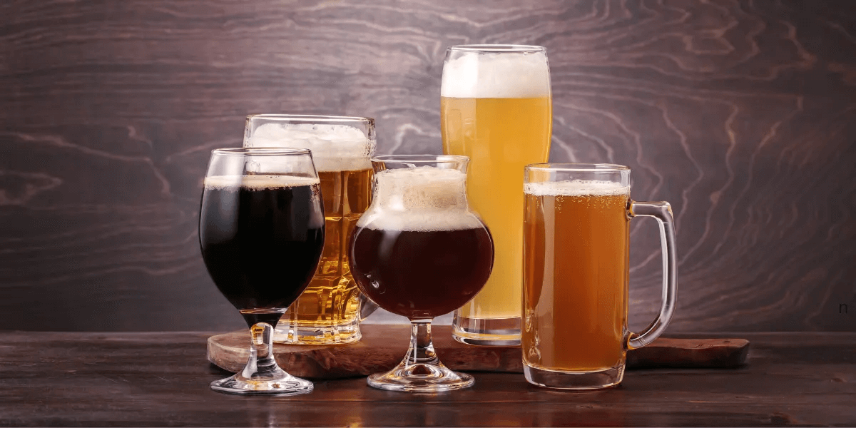 different beers in different styles of mugs