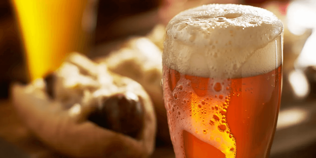 IPA beer with overflowing foamy head