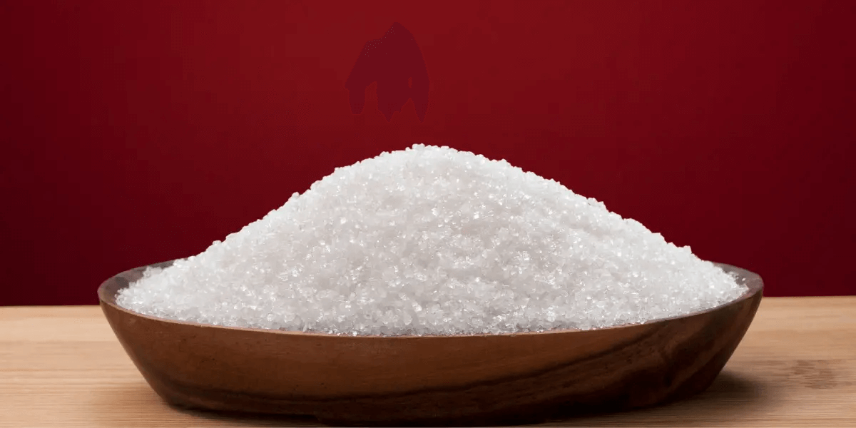 Sugar in wooden bowl