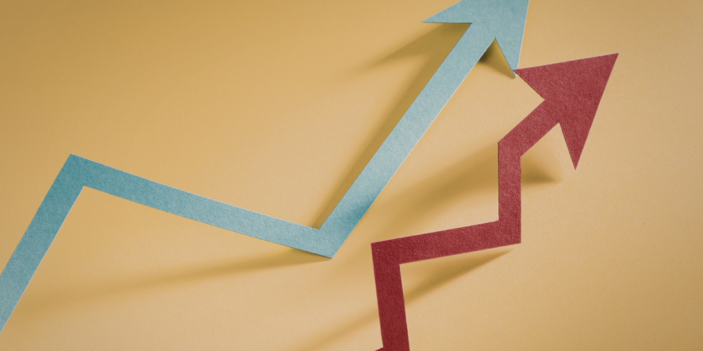 a graphic representation of market trends using two arrows