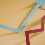a graphic representation of market trends using two arrows